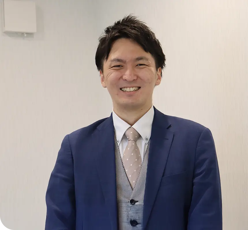 採用担当 成澤